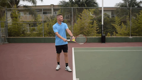 Tennis Serve Trophy Pose Backswing