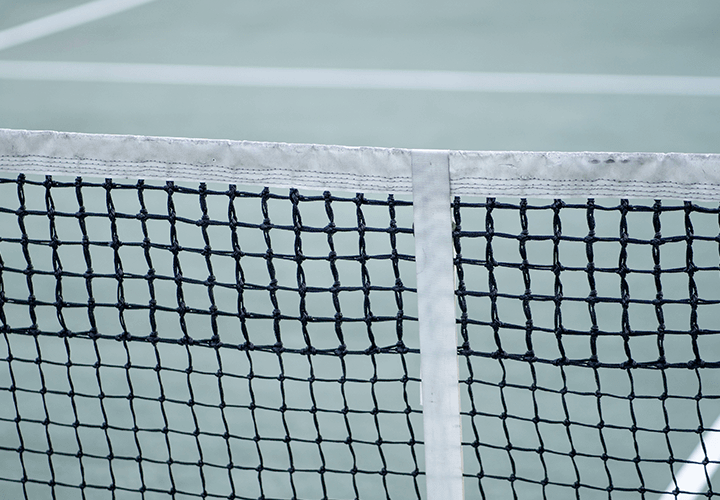 How to Adjust a Tennis Net's Height