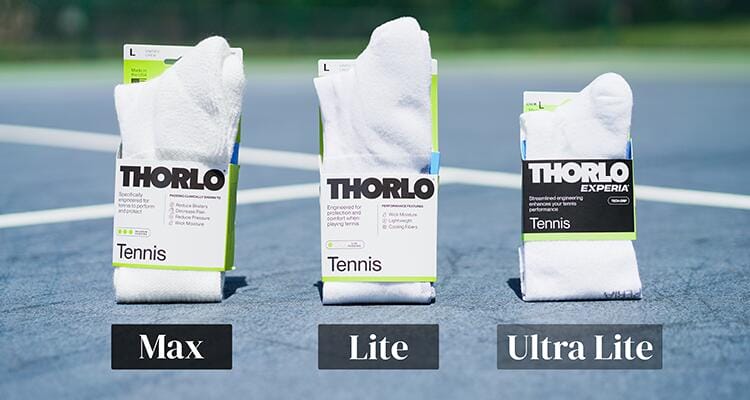 The Maximum Cushion, Lite Cushion, and Experia Ultra Lite Socks Sitting Side-by-Side on a Tennis Court