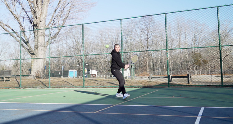 Jon Crim Hitting a Backhand with Luxilon 4G